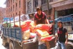 Bhattedanda villagers buying rice for distribution