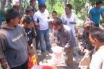 Distributing rice in Bhattedande