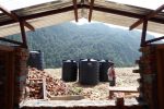 Water tanks waiting to be installed, SJD school